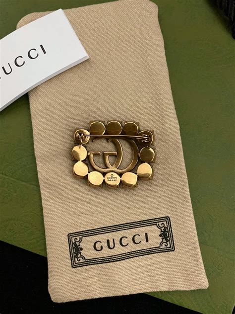 Amazon.com: Gucci Brooches.